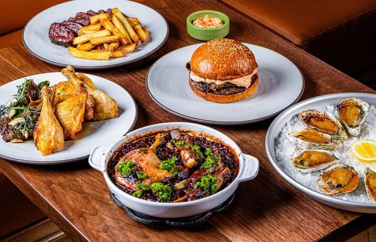 Assorted dishes on the table at Bistro Lagniappe